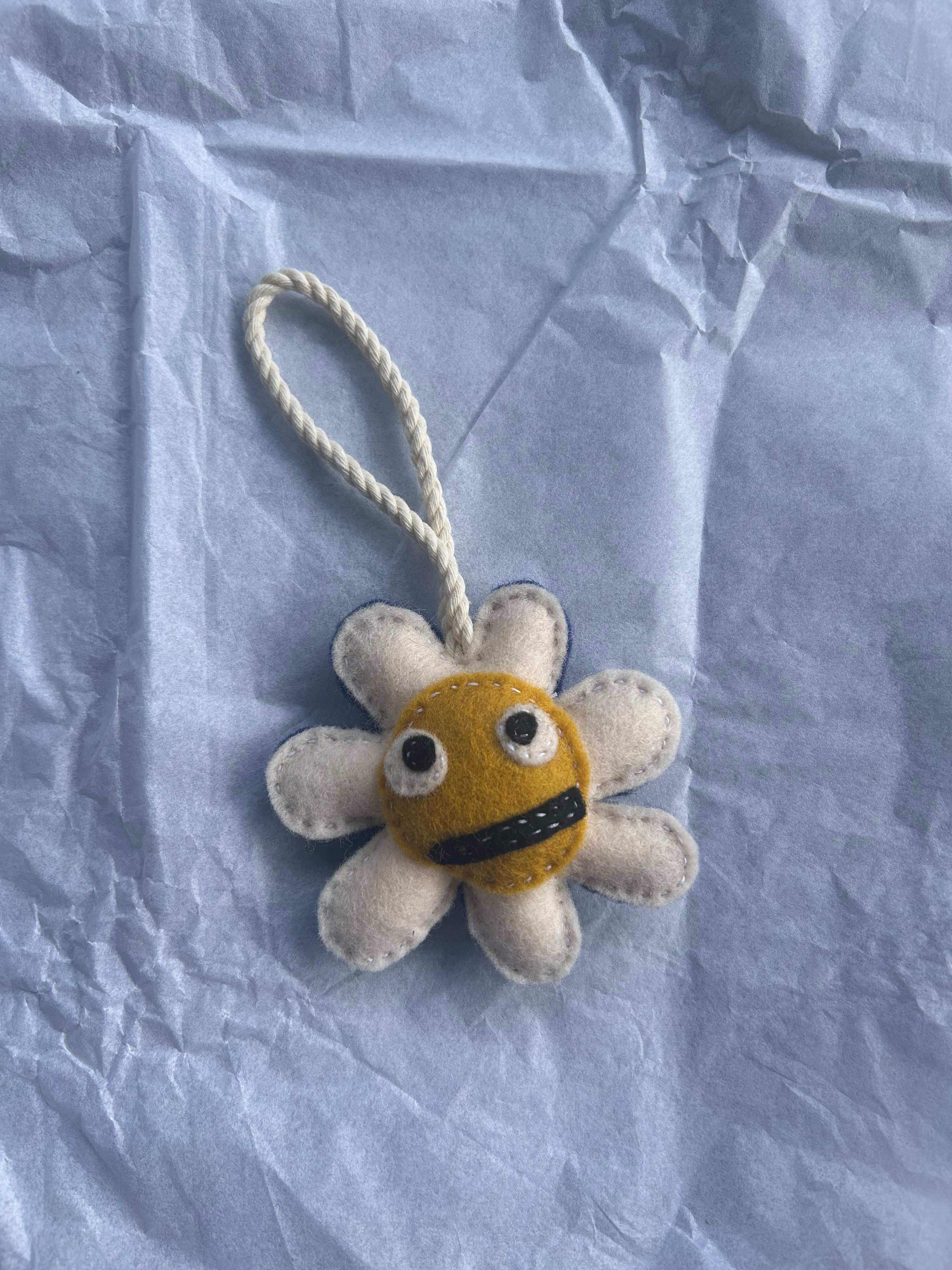 Daisy charm